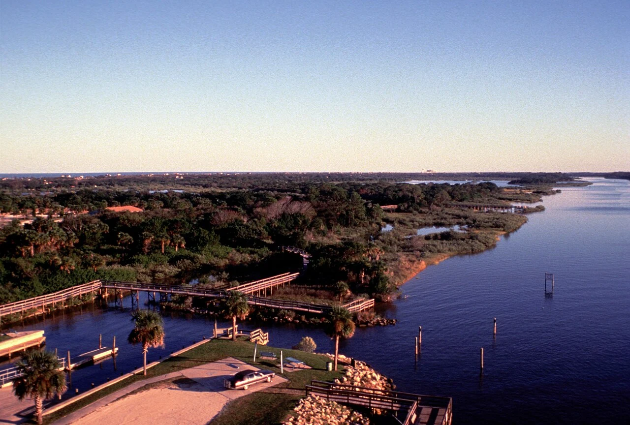 Historical view of Florida’s Flagship Harbor shoreline and boardwalks; illustrative setting, not confirmation of current fishing access.